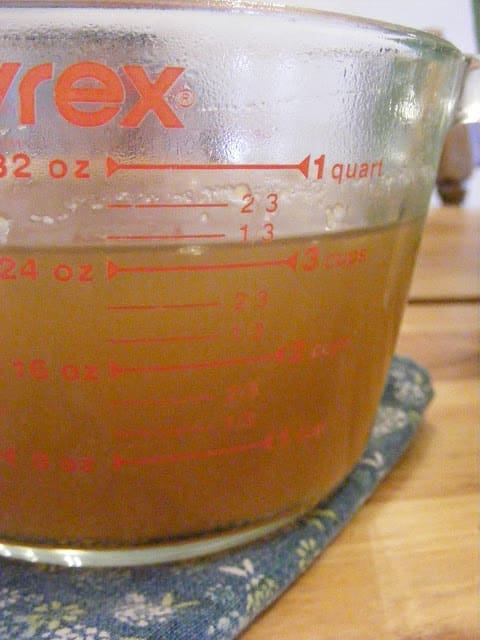 chicken-broth-in-measuring-cup