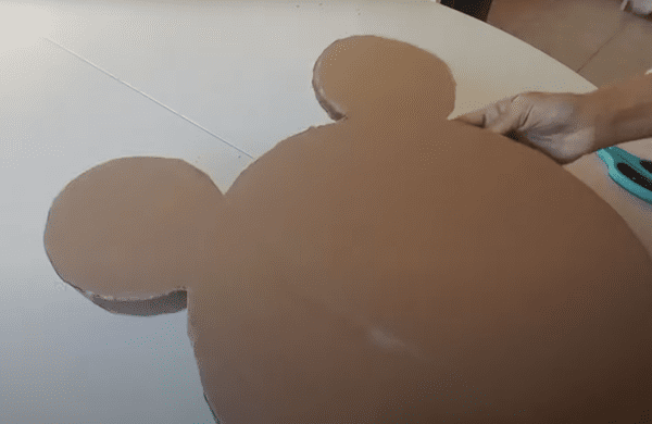cutting-2-mickey-stencils-to-make-pinata