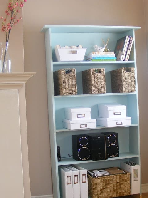 living-room-with-teal-cabinet-storage