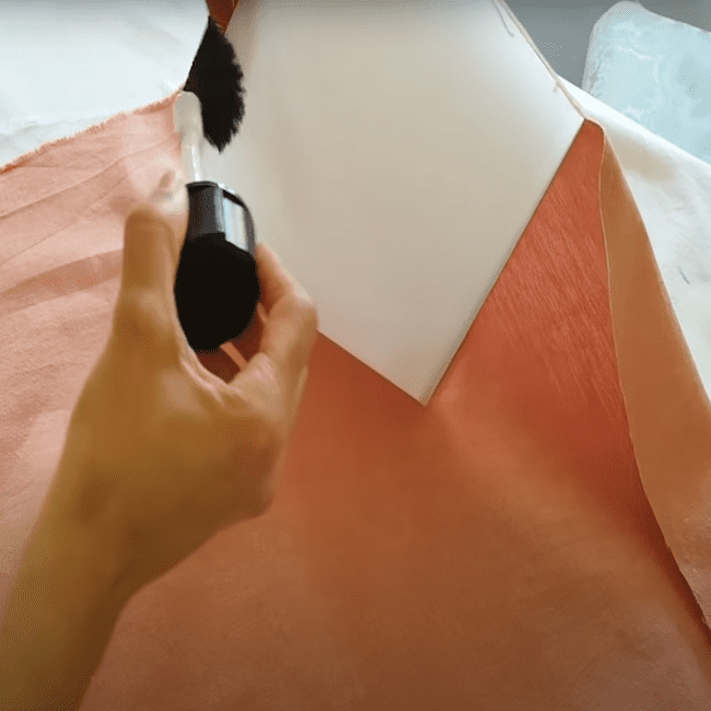 putting-glue-and-fabric-on-lampshade